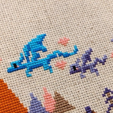 Close-up photograph of the completed cross-stitch