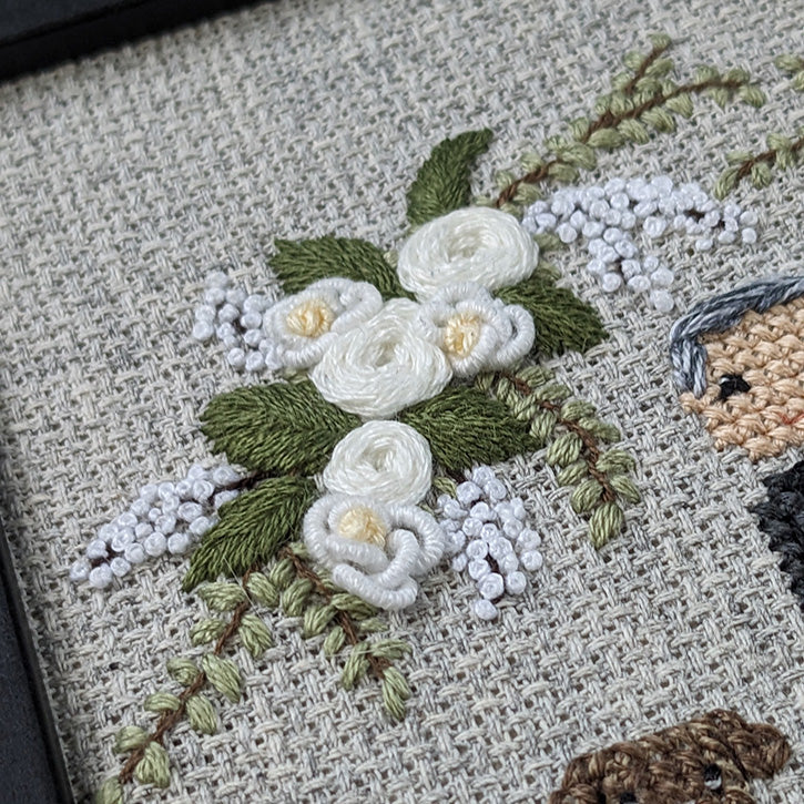 Hand embroidered floral embellishments