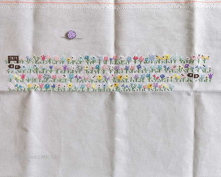A work-in-progress cross-stitch of my DIY Flower Field pattern