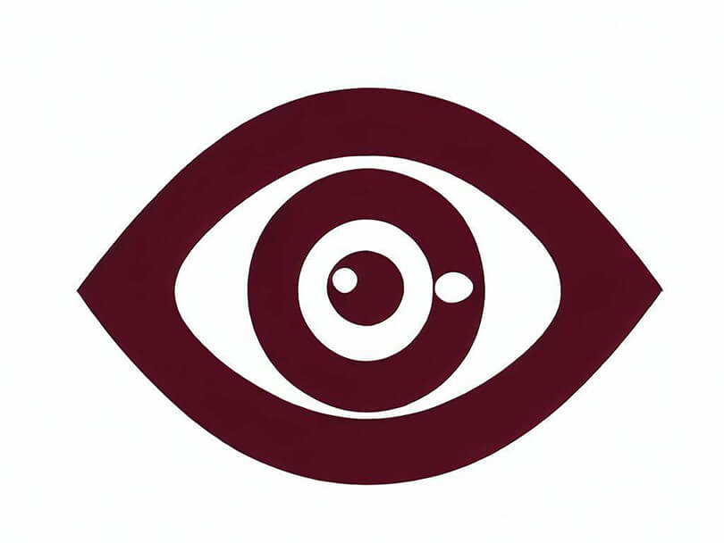 A maroon evil eye symbol
