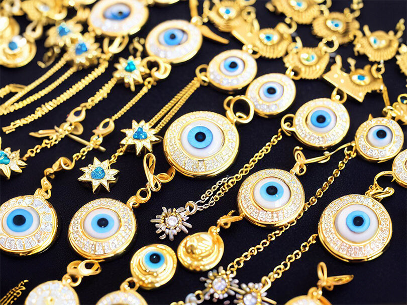 Collection of gold evil eye jewelry