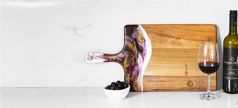 Large Merlot Cheese Board On A Counter With Wine