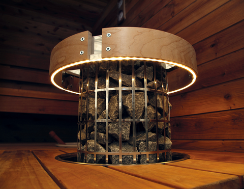harvia cilindro sauna heater embedded into sauna benches