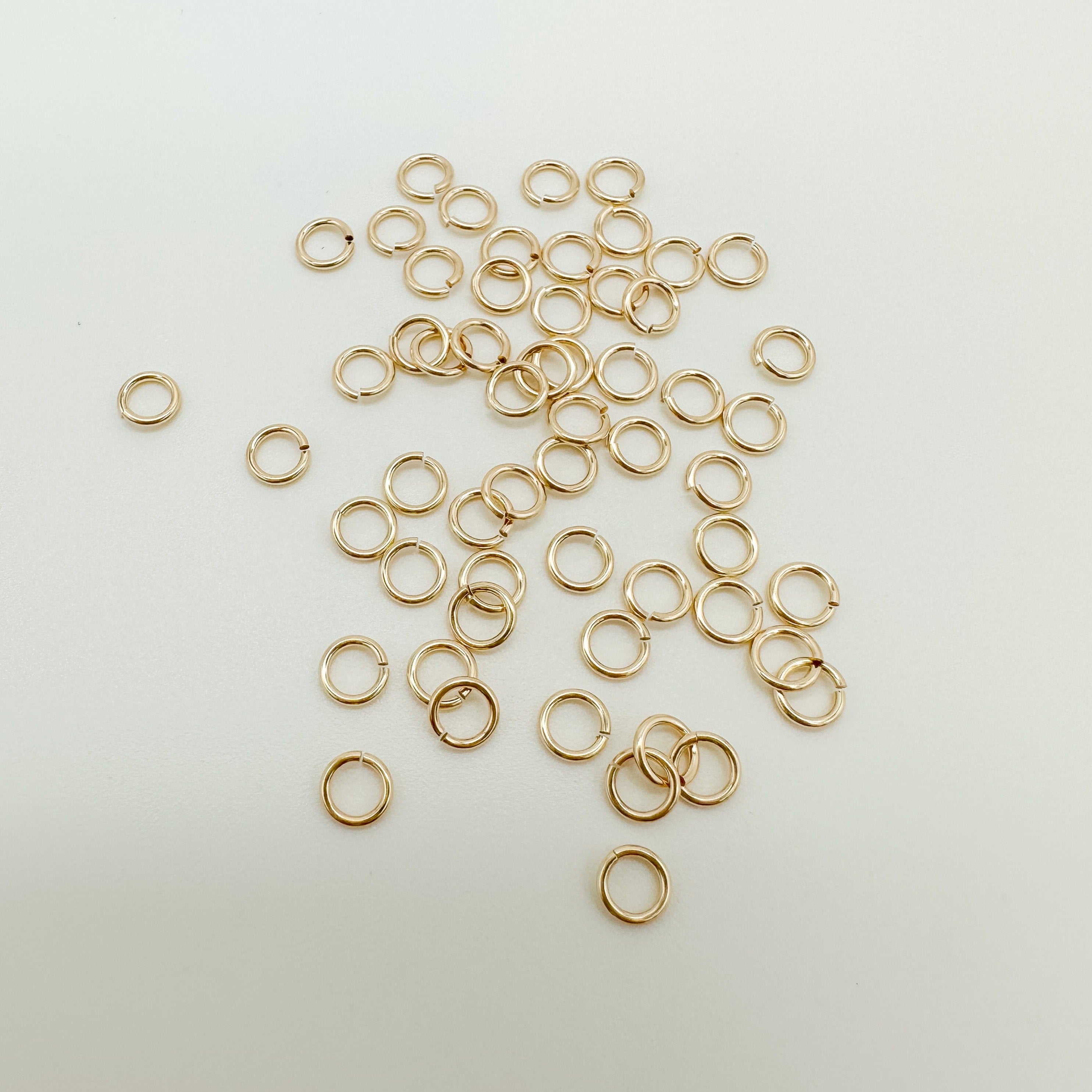 5x7mm Oval Jump Ring 14k Gold Filled Qty 10 - da Bead Shop