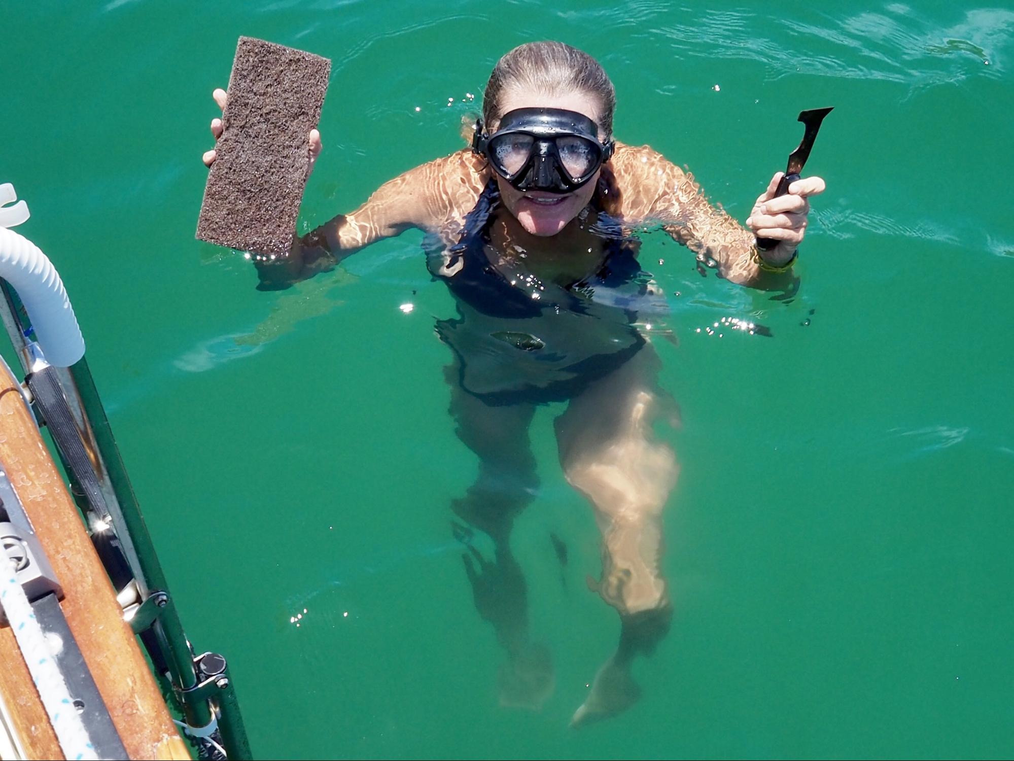 Cheyenne cleaning the hull