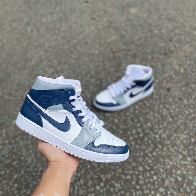 grey and navy blue jordans