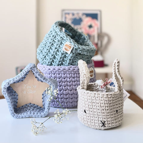 Collection of baskets crocheted with recycled yarn