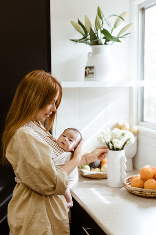 Getting housework done in a Chekoh Stretchy Baby Wrap - Hands-free parenting made easy