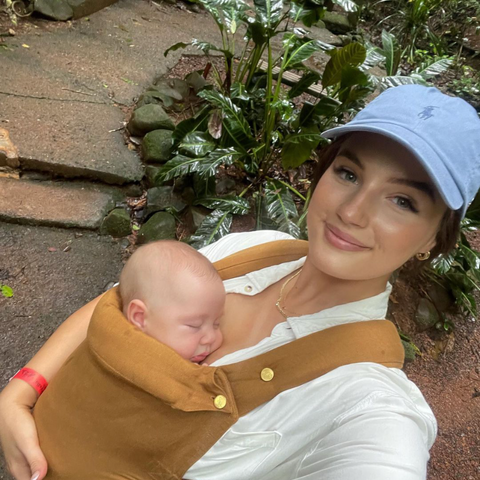 Sarah Buckland @sarahrenee_official in the Chekoh Baby Carrier in Ochre