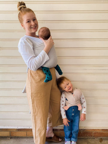 Dayna Mareeg and family wearing Chekoh baby wraps