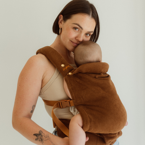 Ruby wearing Mocha Cord Clip with Baby Peggy