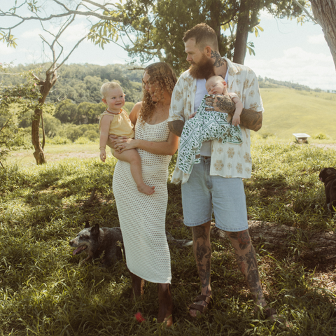 Beautiful Sunshine Coast family wearing Chekoh Baby Swaddle in new print Nevada