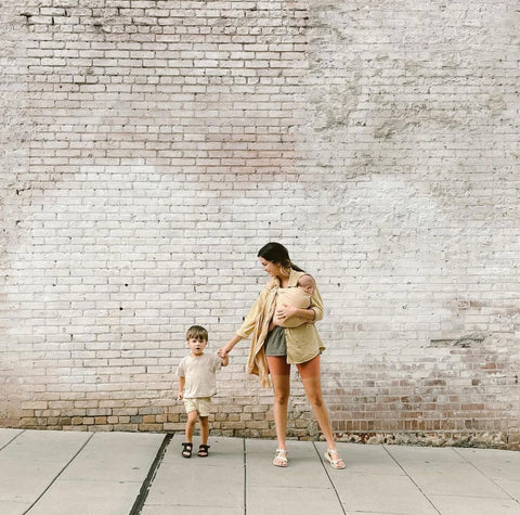 Natalie and her children with a Ring Sling by Chekoh Baby Carriers