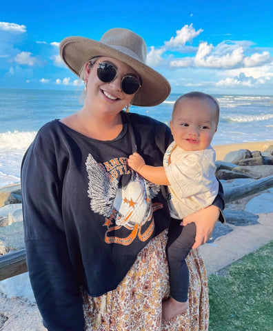 Mama Shae enjoying a beach stroll with her son Kingston