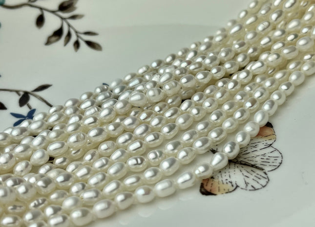 62-64 PCS/STRAND/LINE' RICE PEARLS' NATURAL FRESHWATER PEARL BEADS NAT –  Madeinindia Beads