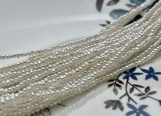 Tiny Natural White Seed Pearls - 1.5-2mm Freshwater Pearl Beads –  QualityBeadMart