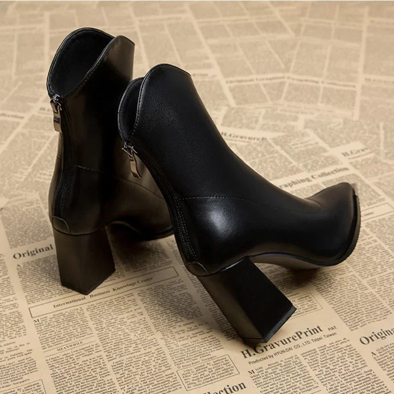 Black leather ankle boots with metal toe detail shown from different angles