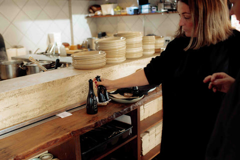 Justina, Manager of Ortolana [Britomart] and Lily of Lil Ceramics discuss new Oil Pourers