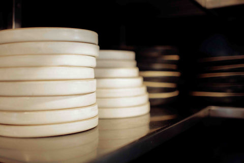 Stacks of Lil Ceramics plinths on Kol, Ponsonby's kitchen shelves