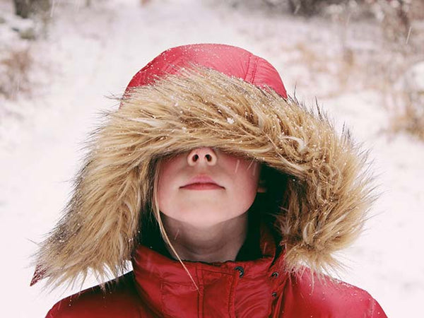  Girl in red winter snow jacket by Jon Tyson