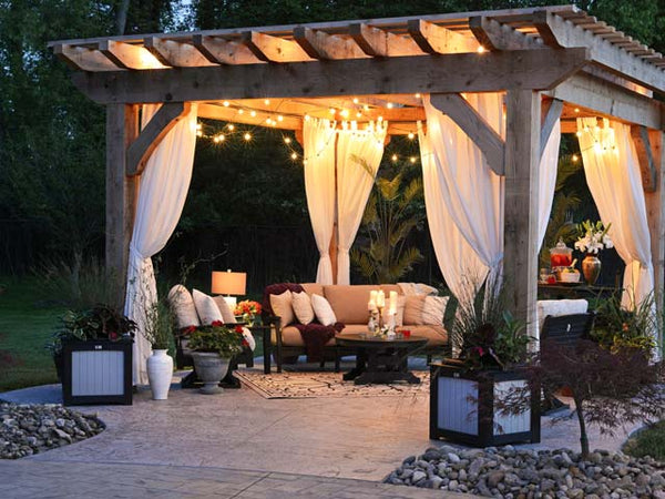 Nicely lit outdoor Pergola by Randy Fath