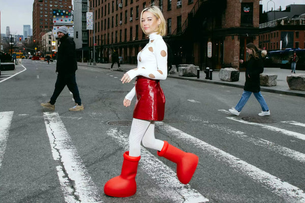 Girld wearing big red boots called mschf