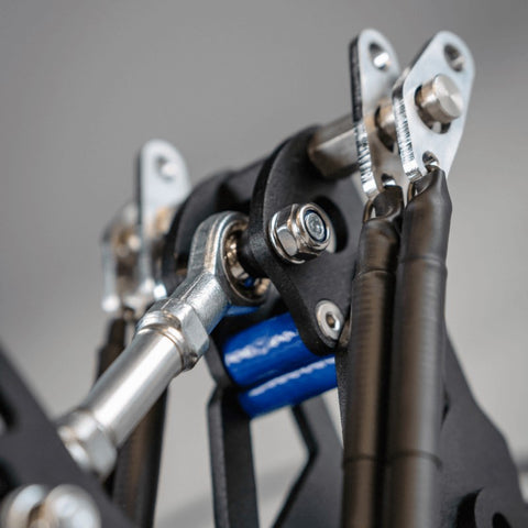 Close up sim racing pedal arm