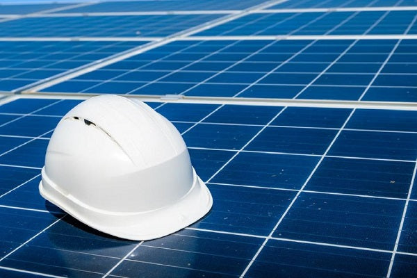 helmet-on-solar-panels