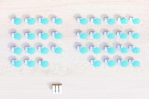 aerial shot of beach chairs