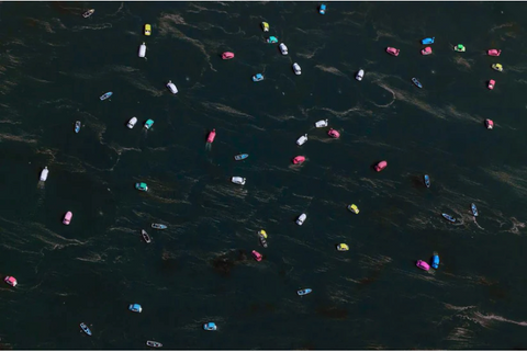 Aerial shot of boats in the sea