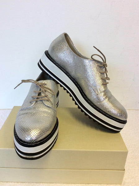 moda in pelle silver shoes