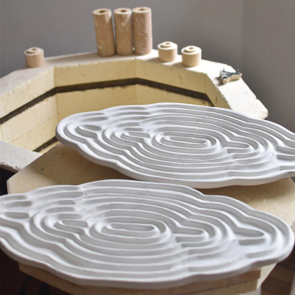 Custom pottery platters soon to be fired in the kiln, handcrafted by OWO Ceramics