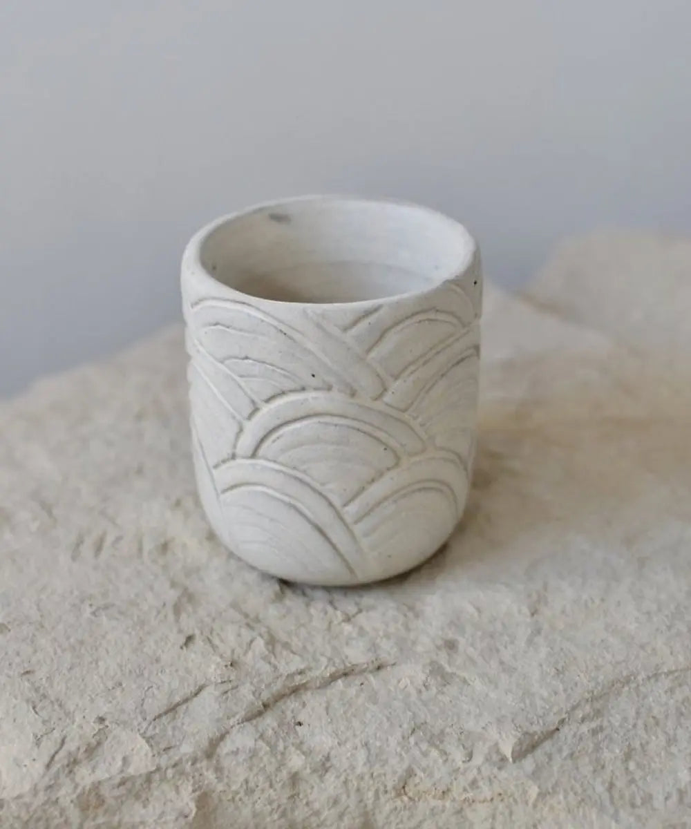 Custom espresso cup handcrafted by OWO Ceramics inspired by the sea waves