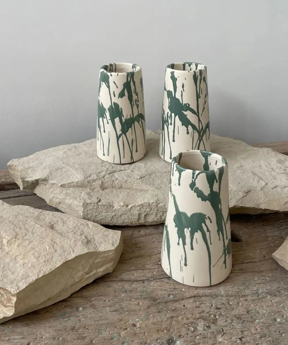 Sage green splatterware pottery vases custom-made for San Francisco’s interior design store Anyon Atelier