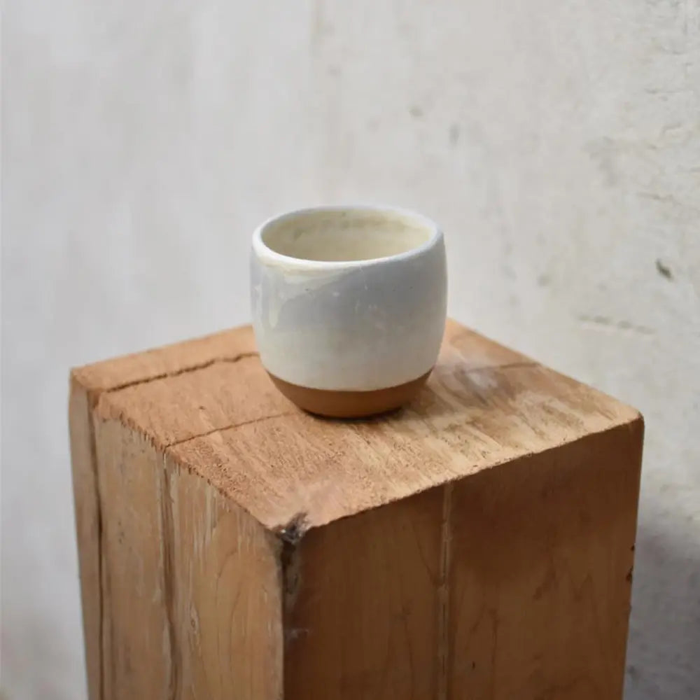 Custom coffee cup for Qatar's interior design company Remal, handcrafted by OWO Ceramics