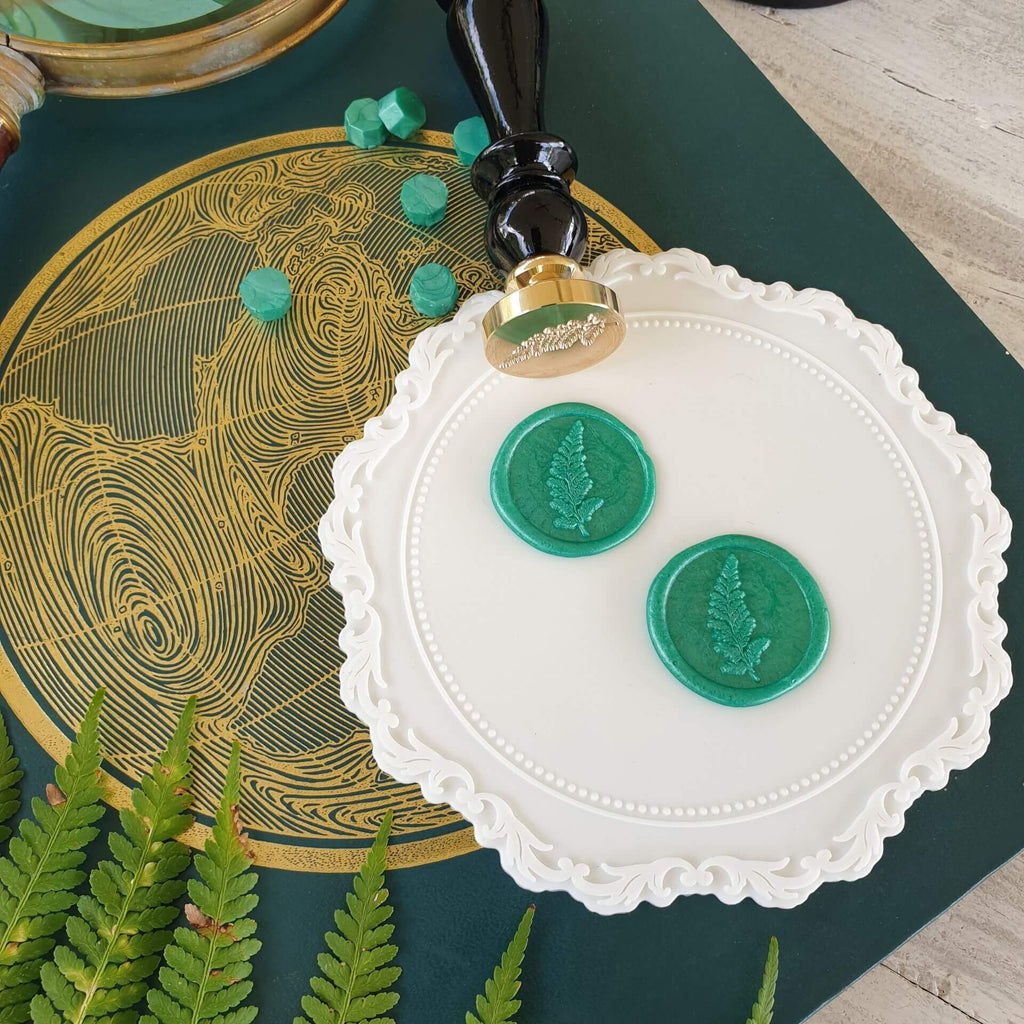 Green fern leaf wax seals with fern wax seal stamp and white wax seal silicone mat