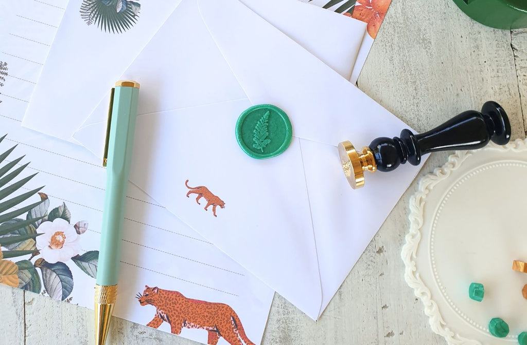 leopard floral stationery set with leaf wax seal and green pen