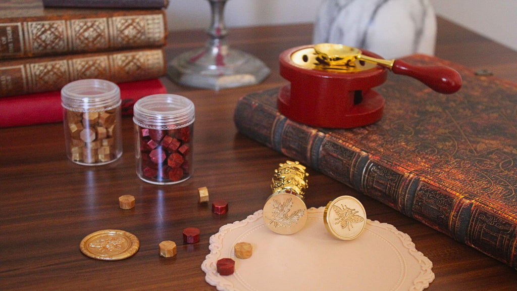 Tuscan wax seal kit on desk with wax seals