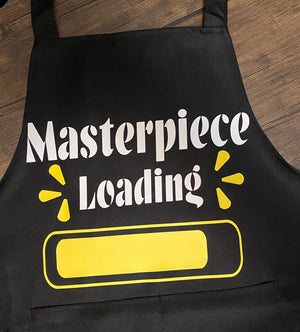 “Masterpiece Loading” Apron - Prolific Paradox LLC