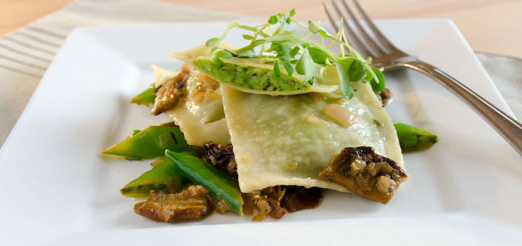 Garden Mint Pea Ravioli with Porcini Mushrooms & White Wine