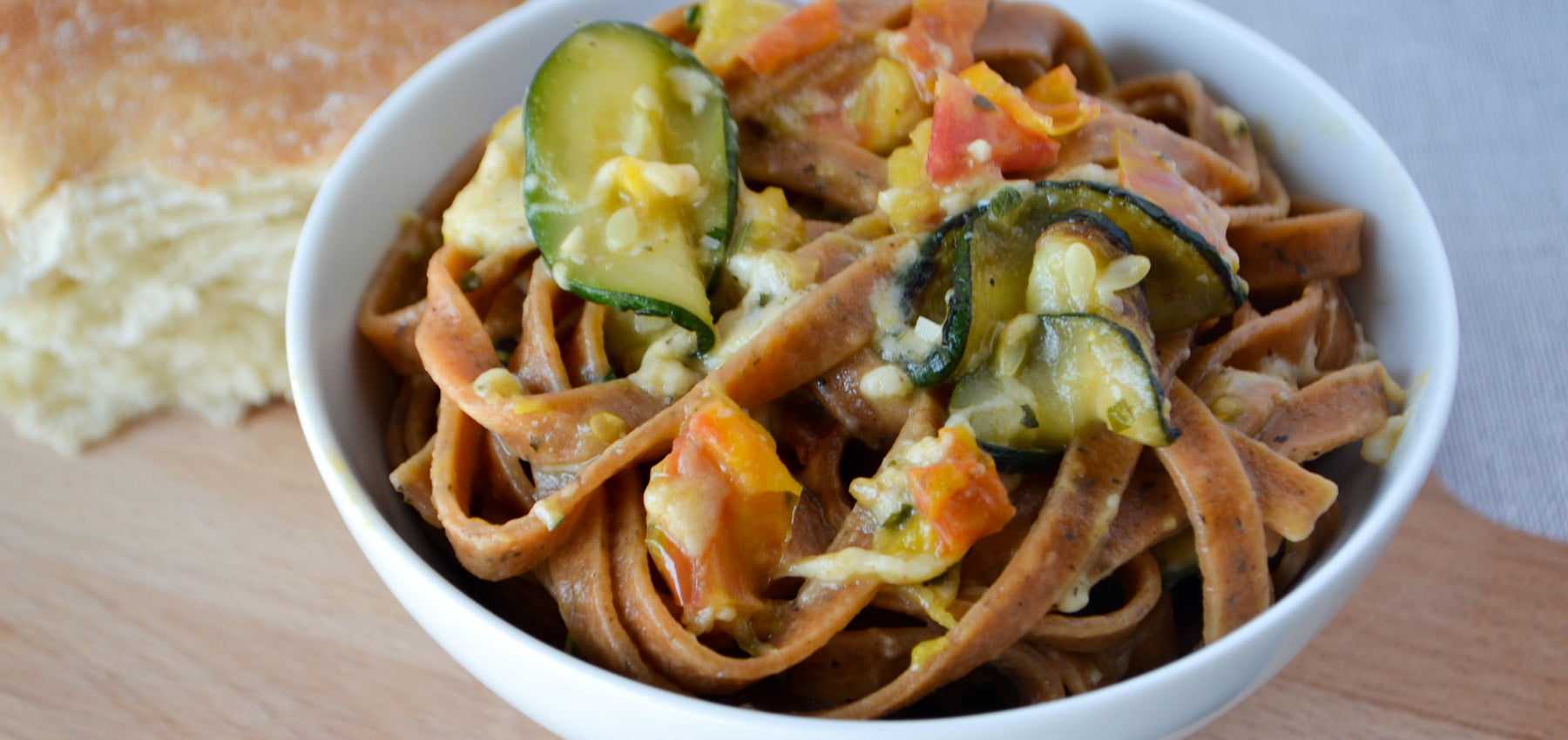 Zucchini & Parmesan over Tomato Basil Fettuccine