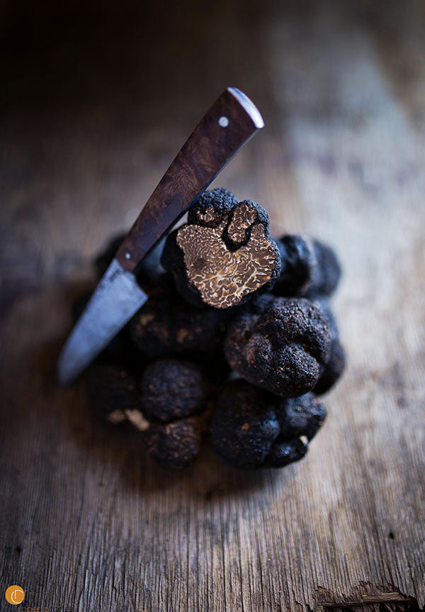 Chef Roberto Cortez with black truffles and his Bryan Raquin Paring Knife.