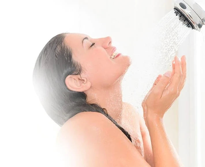Woman Taking a Shower with a Smile in Clean Fresh Water