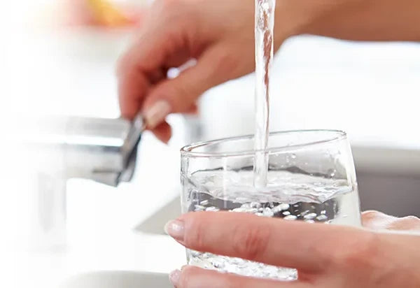 Pouring Glass of Clean Refreshing Water
