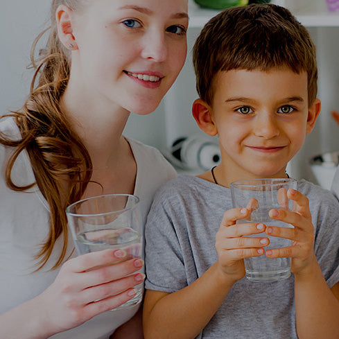 Family Drinking Clean Purified Softened Water Together