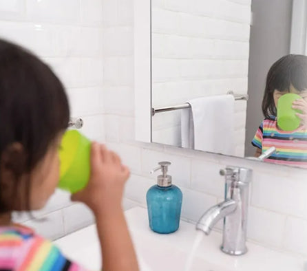 Little Girl Drinking Water