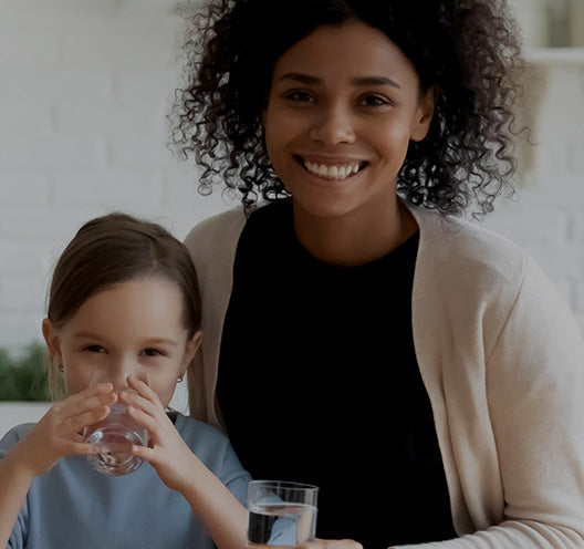 Family Drinking Clean Purified Softened Water Together