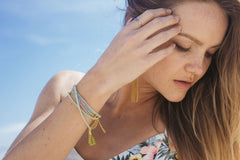 Girl Wearing Lots Of Bracelets 
