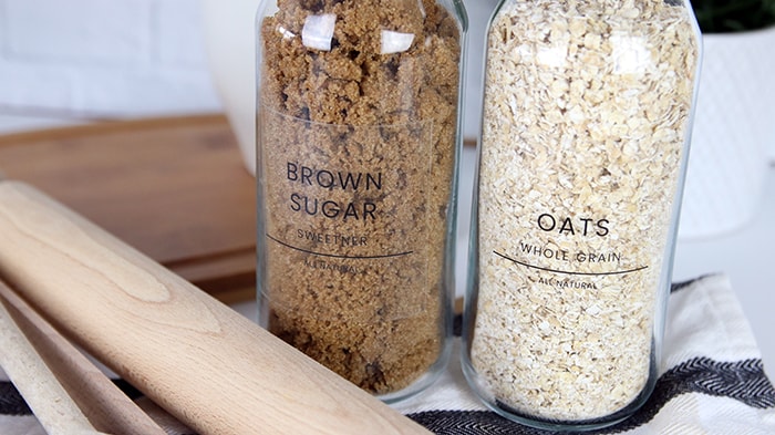 Clear eco friendly stickers applied to glass containers with brown sugar and oats