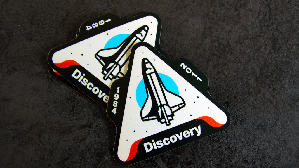 Gestanzte Magnete mit Discovery-Rocket-Logo